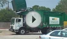 Waste Management MACK MCNEILUS Frontloader in action